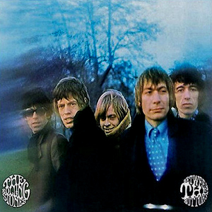 album cover between the buttons